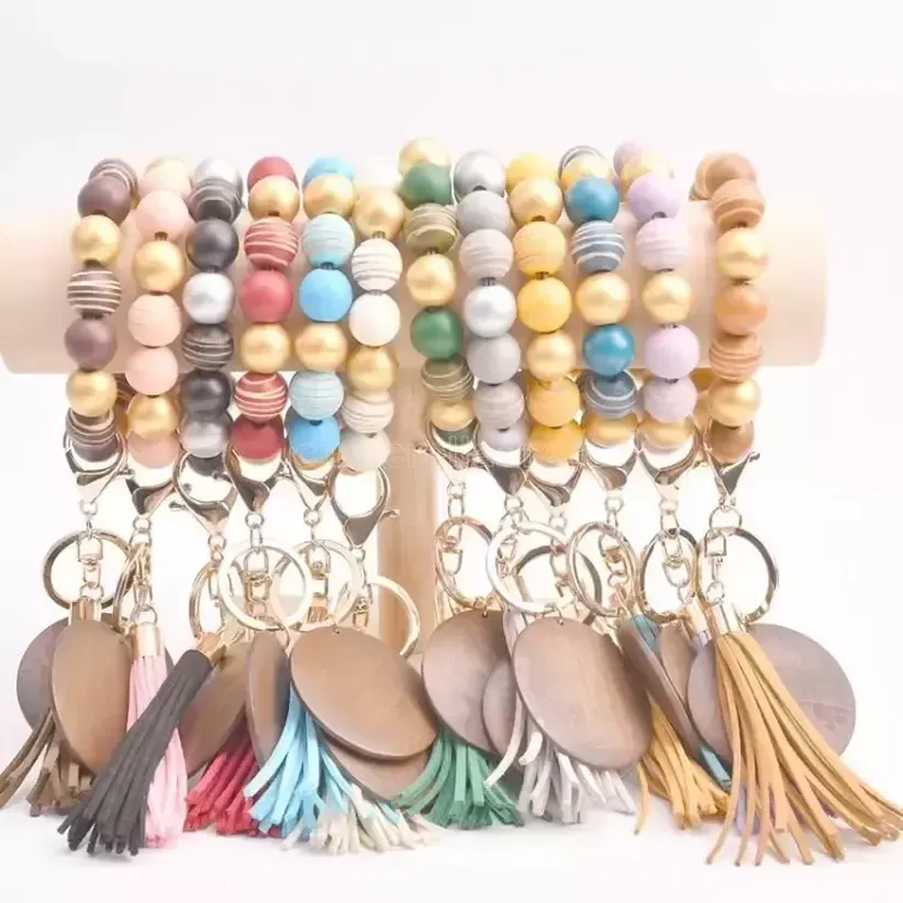 Bracelet keychain wood beaded tassels keychain party favor personalized disc oranament souvenir wristlet key ring women wrist
Bracelet keychain wood beaded tassels keychain party favor personalized disc oranament souvenir wristlet key ring women wrist