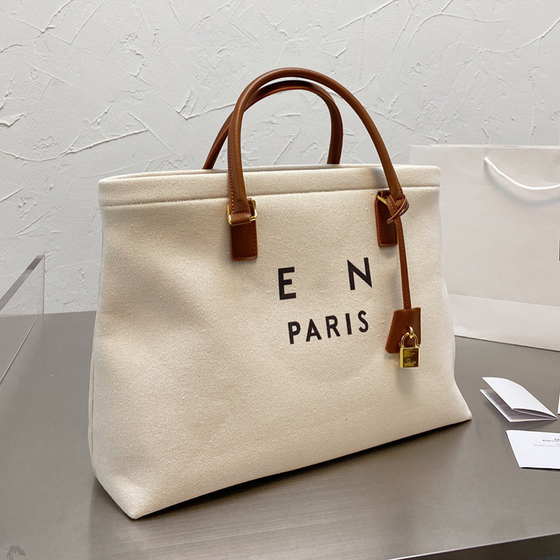 Designer Women Cabas Canvas Tote Bag Paris Brand Letter Printed Totes Handbags Woman Shopping Shoulder Handbag Luxurys Designers Bags
Designer Women Cabas Canvas Tote Bag Paris Brand Letter Printed Totes Handbags Woman Shopping Shoulder Handbag Luxurys Designers Bags