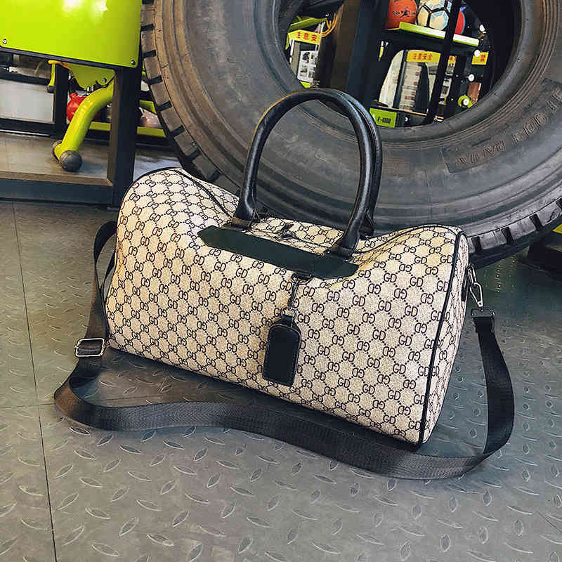New fashion versatile business travel bag boarding PU leather large capacity pendant sports fitness luggage handbag luxury
New fashion versatile business travel bag boarding PU leather large capacity pendant sports fitness luggage handbag luxury
