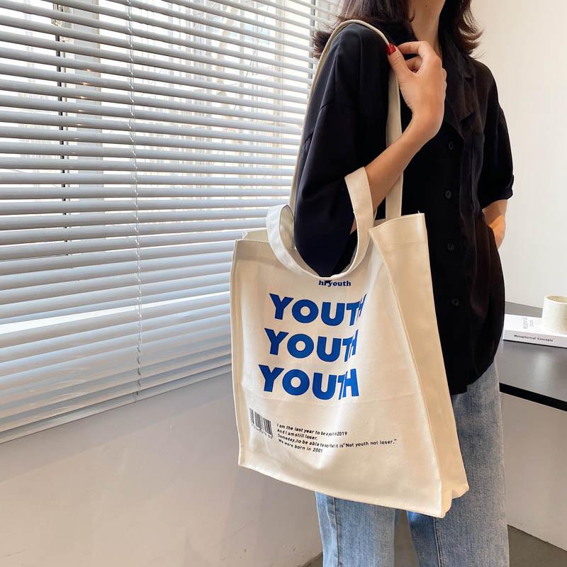 Evening Bags Women Canvas Shopping Bag YOUTH Letters Print Female Cotton Cloth Shoulder Eco Handbag Tote Reusable Grocery Shopper, Approx. 35x36cm
Evening Bags Women Canvas Shopping Bag YOUTH Letters Print Female Cotton Cloth Shoulder Eco Handbag Tote Reusable Grocery Shopper, Approx. 35x36cm