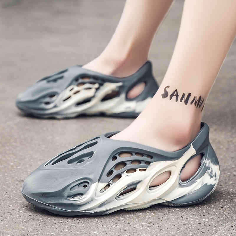 Yeezee Slide Hongxing Erke Coconut Slippers Men Wear Thick Soled Anti-skid Beach Hole Shoes in Summer, Trampling on Excrement Feeling Flip Flops, Grey color
Yeezee Slide Hongxing Erke Coconut Slippers Men Wear Thick Soled Anti-skid Beach Hole Shoes in Summer, Trampling on Excrement Feeling Flip Flops, Grey color