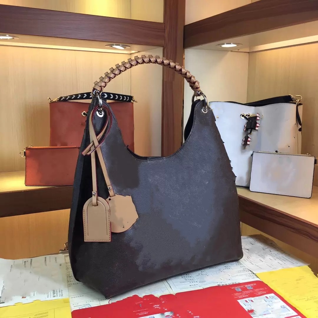 Carmel hobo bag Mahina perforated leather Totes Women Vintage Designer Luxurys MM Taurillon Shoulder Bags Crossbody Letter Flower Pocket Monograms M53188
Carmel hobo bag Mahina perforated leather Totes Women Vintage Designer Luxurys MM Taurillon Shoulder Bags Crossbody Letter Flower Pocket Monograms M53188