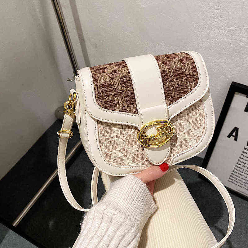 Pu minority bag women's One Shoulder Messenger small square horse drawn car fashion versatile high texture hand, White
Pu minority bag women's One Shoulder Messenger small square horse drawn car fashion versatile high texture hand, White