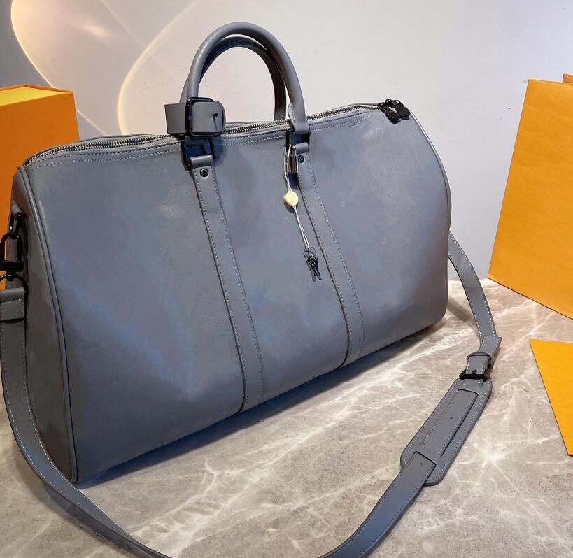 Fashion Unisex Travelling Bag Solid Color Leather Embossing High Capacity Luxury Men Women Commerce Travel Portable High Quality Handbag, Dusty blue
Fashion Unisex Travelling Bag Solid Color Leather Embossing High Capacity Luxury Men Women Commerce Travel Portable High Quality Handbag, Dusty blue
