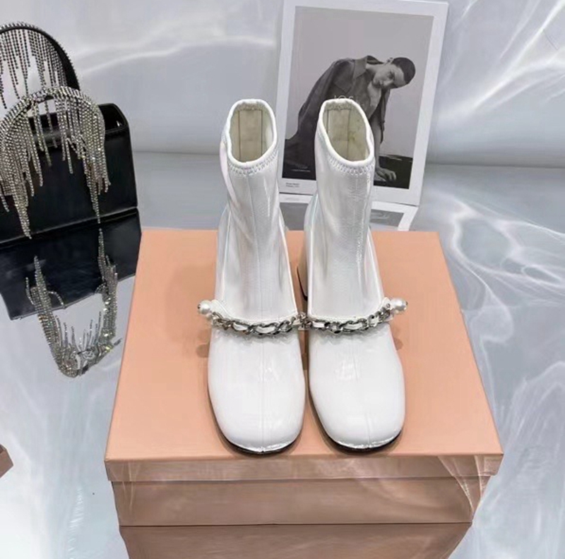 White Designers Women Boots Ankle Booties Thick Bottom Luxury Ladies Shoes Winter Leather Shoe
White Designers Women Boots Ankle Booties Thick Bottom Luxury Ladies Shoes Winter Leather Shoe