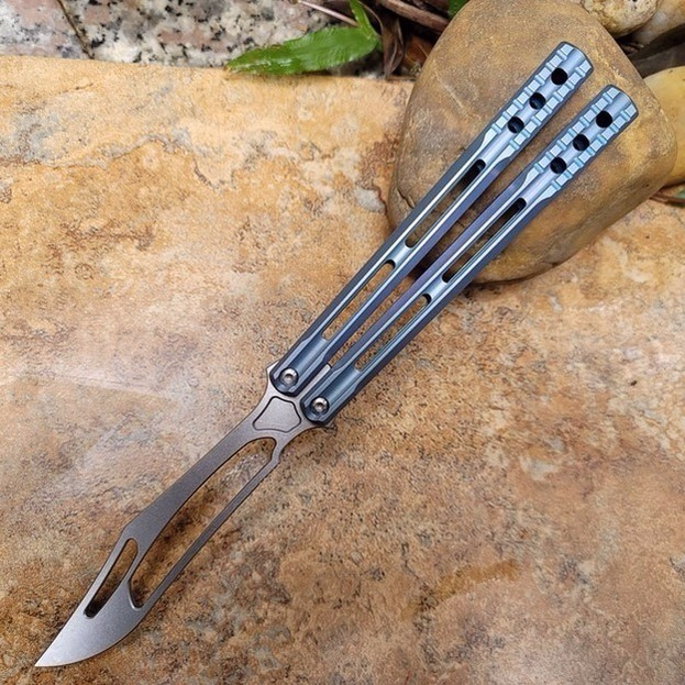 TheOne orca Butterfly Trainer Jilt Knife D2 titanium Handle Bushings Free-swinging training Knife EDC Gift
TheOne orca Butterfly Trainer Jilt Knife D2 titanium Handle Bushings Free-swinging training Knife EDC Gift