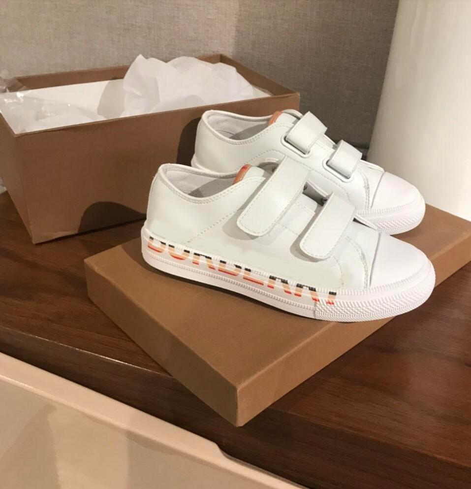 Famous Designer Children Sneakers Boys and Girls Genuine Leather Velcro Shoes Casual boots Size: 24-35 White color, Shipping pay
Famous Designer Children Sneakers Boys and Girls Genuine Leather Velcro Shoes Casual boots Size: 24-35 White color, Shipping pay