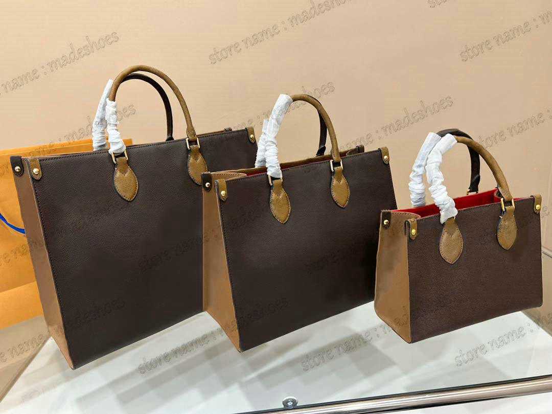 ONTHEGO MM PM GM Tote Business Bag On The Go 25CM Shopping Bag Womens Luxurys Handbag Designer Totes 41cm Cross Body Large Capacity Classic Top handle Bags
ONTHEGO MM PM GM Tote Business Bag On The Go 25CM Shopping Bag Womens Luxurys Handbag Designer Totes 41cm Cross Body Large Capacity Classic Top handle Bags