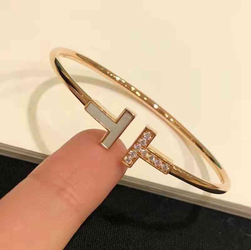 Factory designer bangle T home Bracelet S925 silver double women039s style with diamond Fritillaria simple fashion5535048 KT72
Factory designer bangle T home Bracelet S925 silver double women039s style with diamond Fritillaria simple fashion5535048 KT72
