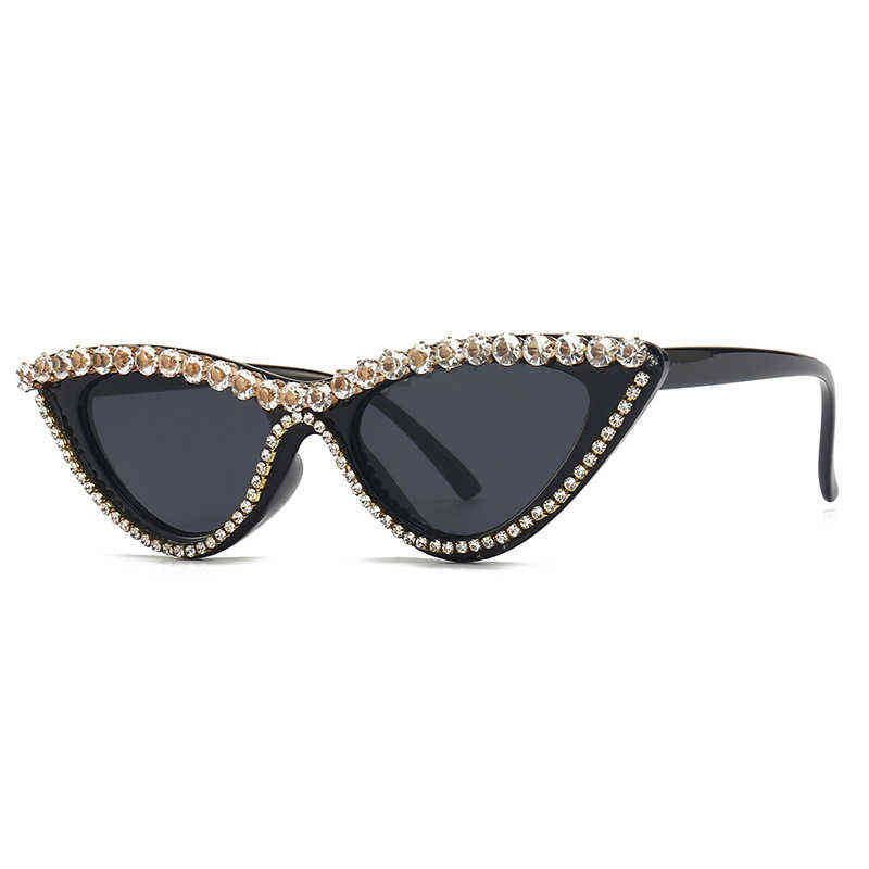 Sun glass new fashion eye Rhinestone women's Sunglasses hip hop personality Sunglasses
Sun glass new fashion eye Rhinestone women's Sunglasses hip hop personality Sunglasses