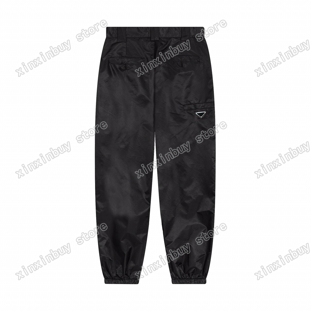 22ss Mens women designer pants Metal triangle label Pocket Nylon pant Men Webbing Trousers black white xinxinbuy S-XL
22ss Mens women designer pants Metal triangle label Pocket Nylon pant Men Webbing Trousers black white xinxinbuy S-XL