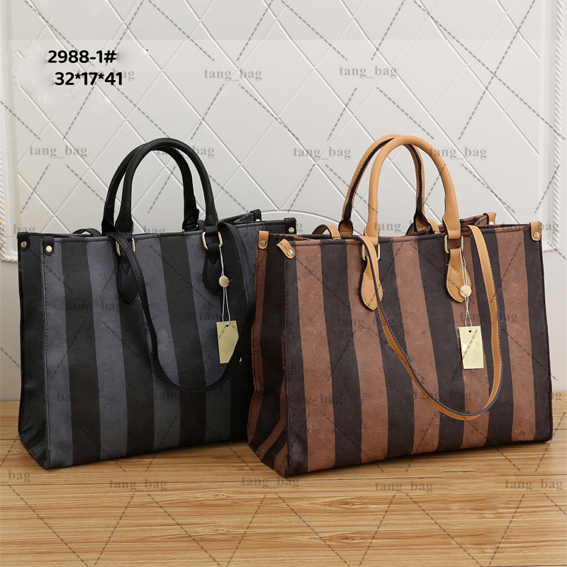 Designer totes High quality leather perforation bags fashion classic handbags for women pouch woman shopping shoulder bag, Black 
Designer totes High quality leather perforation bags fashion classic handbags for women pouch woman shopping shoulder bag, Black