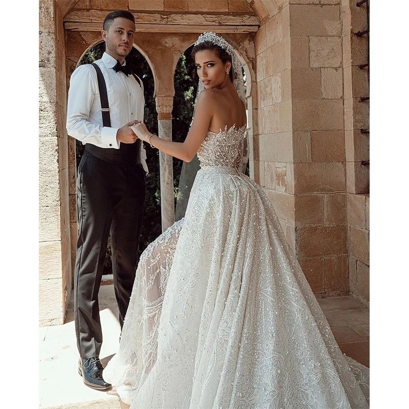 urious Ball Gown Wedding Dresses Strapless One Long Sleeve Bateau Sequins Appliques Detachable Train or Length Bridal Gowns Plus Size robes de soiree