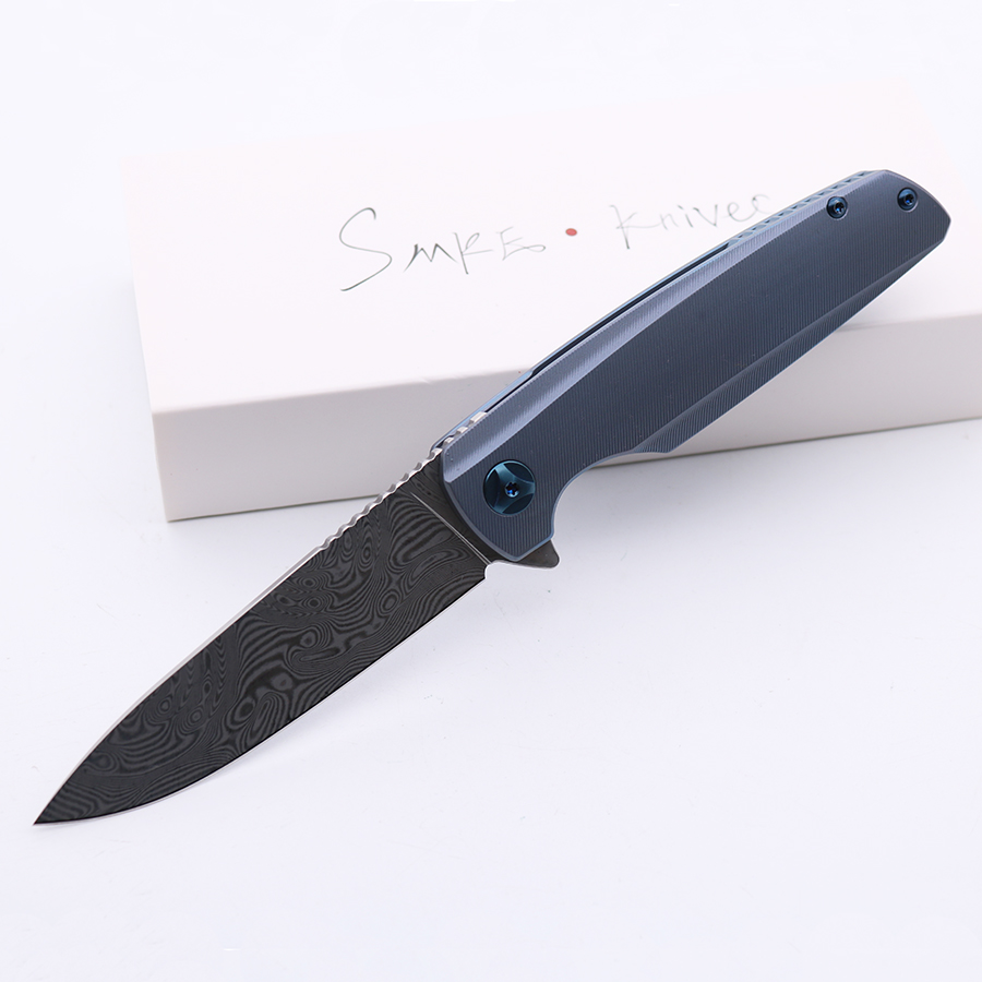 High Quality SMKE Knives Specter Pocket Folding Knife Damascus Blade Blue Anodized Titanium Handle Tactical Survival Knife Outdoor Tools
High Quality SMKE Knives Specter Pocket Folding Knife Damascus Blade Blue Anodized Titanium Handle Tactical Survival Knife Outdoor Tools
