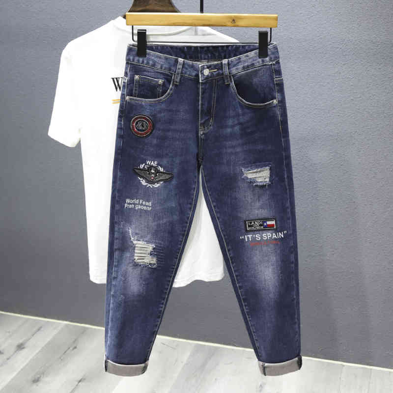 Trendy brand embroidered printed perforated jeans men's style slim fit small feet versatile elastic casual long pants men, Blue
Trendy brand embroidered printed perforated jeans men's style slim fit small feet versatile elastic casual long pants men, Blue