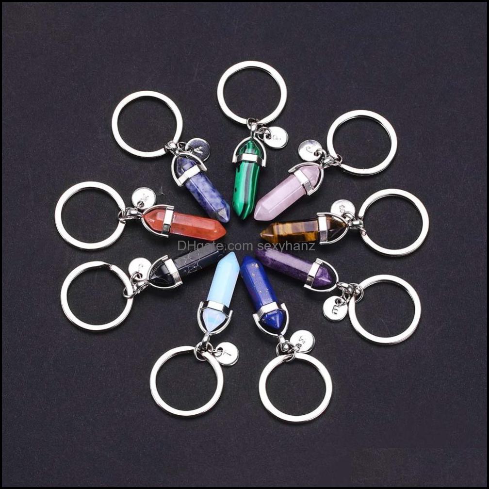 Key Rings Jewelry 26 Letters Mticolor Natural Stone Hexagon Prism Ring Summer Fashion Crystal Quartz Sier Color Keychain For Women Men Round
Key Rings Jewelry 26 Letters Mticolor Natural Stone Hexagon Prism Ring Summer Fashion Crystal Quartz Sier Color Keychain For Women Men Round