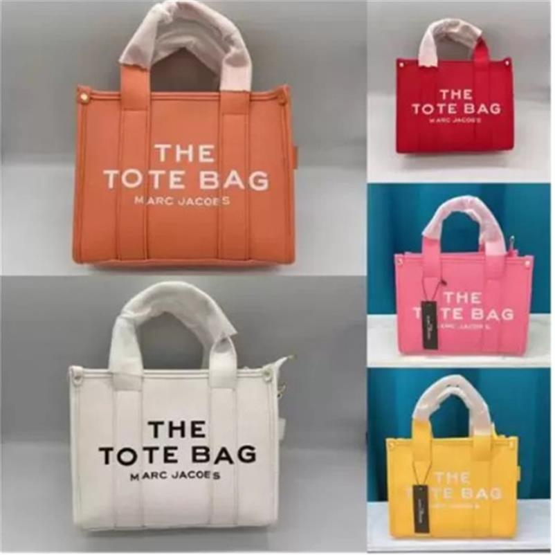 Marc tote bag Womens candy colors ToteBags Fashion Shopper big capacity Shoulder Bags grenadine letter Tote PU Handbags220Z, 27x6x10cm
Marc tote bag Womens candy colors ToteBags Fashion Shopper big capacity Shoulder Bags grenadine letter Tote PU Handbags220Z, 27x6x10cm