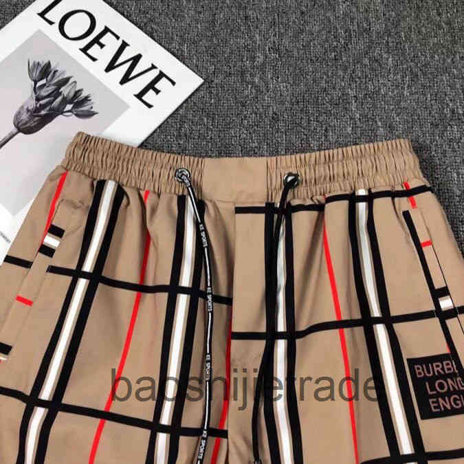 Designer Burbe short High quality beach Pants Capris men's new fashion brand summer direct spray lattice printing casual shorts for men and women, Khaki
Designer Burbe short High quality beach Pants Capris men's new fashion brand summer direct spray lattice printing casual shorts for men and women, Khaki