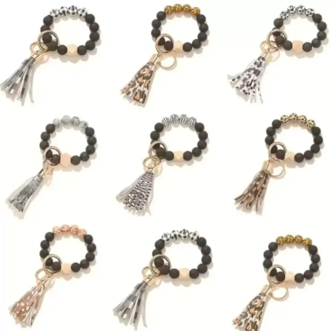 Fashion rosted Wooden Bead Bracelet Keychain Party Favor Pattern Tassel Pendant Bracelets Women Girl Key Ring Wrist Strap 7 Colors T0401
Fashion rosted Wooden Bead Bracelet Keychain Party Favor Pattern Tassel Pendant Bracelets Women Girl Key Ring Wrist Strap 7 Colors T0401