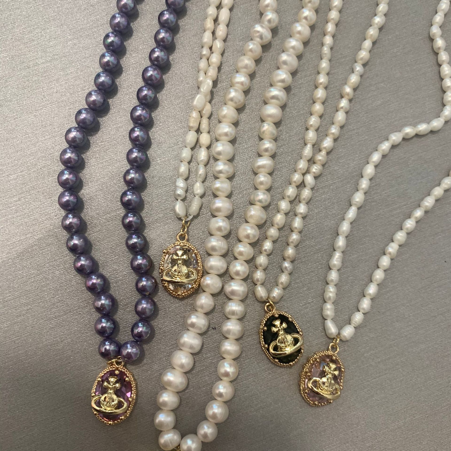 Pendant Series Fashion Light Luxury Natural Pearl Wrapped Zircon OvalNecklace Purple Shell Bead Chain
Pendant Series Fashion Light Luxury Natural Pearl Wrapped Zircon OvalNecklace Purple Shell Bead Chain