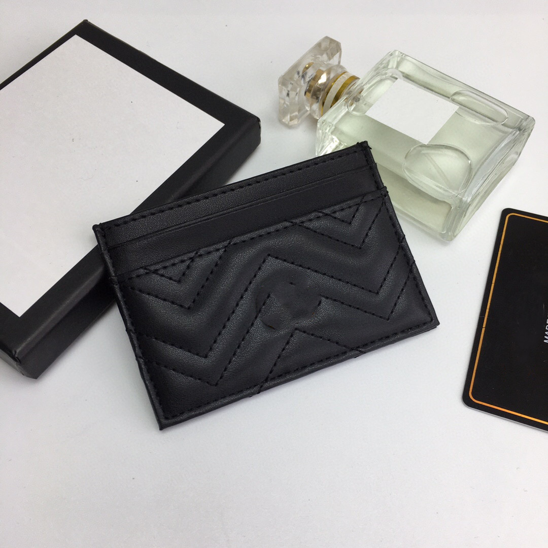Top Quality Men Womens Classic Casual Credit Card Holders Cowhide Real Leather Ultra Slim Wallet Packet Bag for Mans Corn Purses G Y C, Y black silver logo
Top Quality Men Womens Classic Casual Credit Card Holders Cowhide Real Leather Ultra Slim Wallet Packet Bag for Mans Corn Purses G Y C, Y black silver logo