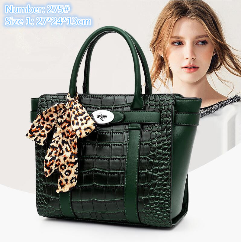 Wholesale factory ladies shoulder bags elegant temperament bow ribbon handbag trend embossed stone pattern jiaozi bag simple Joker solid color leather handbags
