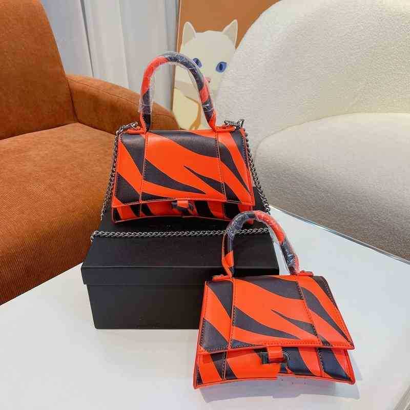 balencaigass hourglass handbags New bag size large 23 * 10 14 small 19,8,12 zly, Sky blue
balencaigass hourglass handbags New bag size large 23 * 10 14 small 19,8,12 zly, Sky blue