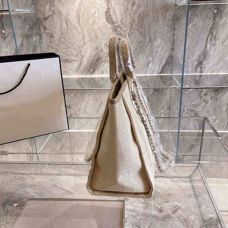 5A 22ss Classic Style Canvas Stripes Beach Shopping Bag Womens Luxury Designer Deauville Chain Double Shoulder Large Capacity Girls, Blue
5A 22ss Classic Style Canvas Stripes Beach Shopping Bag Womens Luxury Designer Deauville Chain Double Shoulder Large Capacity Girls, Blue
