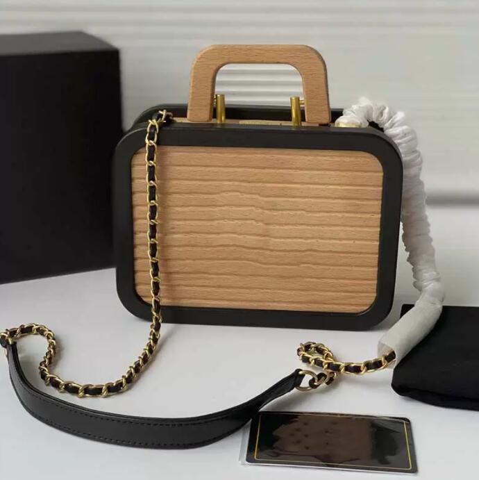 SW 2022 Beech Wooden Box Designer Bags Vanity Cases Quilted Contrasting colors Shoulder Bag Golden Metal Chain Striped Cross body Handle Handbag Designers Womens, Extra freight
SW 2022 Beech Wooden Box Designer Bags Vanity Cases Quilted Contrasting colors Shoulder Bag Golden Metal Chain Striped Cross body Handle Handbag Designers Womens, Extra freight