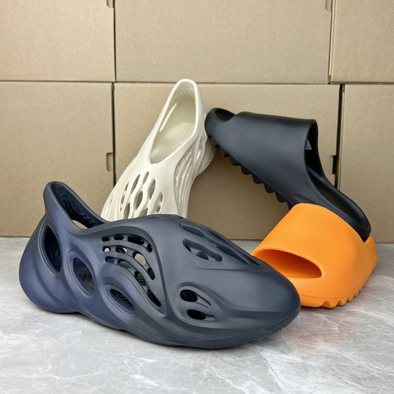 2022 Designer Slides Slippers sandals Graffiti Bone White Resin Desert Sand Rubber Summer Flat Men Women foam pattern flip flop Beach fashion Trainers
2022 Designer Slides Slippers sandals Graffiti Bone White Resin Desert Sand Rubber Summer Flat Men Women foam pattern flip flop Beach fashion Trainers