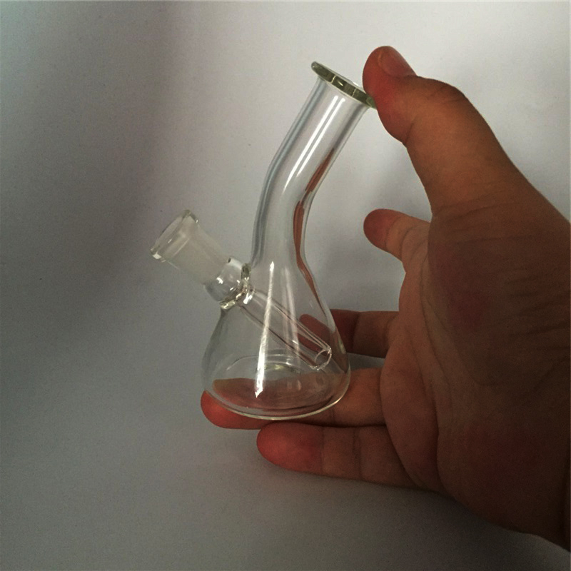 Mini Glass Bong Water Pipes 4.0 inch oil gir glass bong joint 10mm female and glass bong bubbler Pyrex Hand for smoking
Mini Glass Bong Water Pipes 4.0 inch oil gir glass bong joint 10mm female and glass bong bubbler Pyrex Hand for smoking
