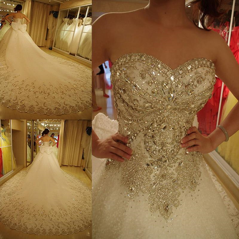 Luxury crystals bling ball gown wedding dresses with bow plus size sweetheart modest rhinestone cathedral train lace up corset bridal gowns, Ivory
Luxury crystals bling ball gown wedding dresses with bow plus size sweetheart modest rhinestone cathedral train lace up corset bridal gowns, Ivory