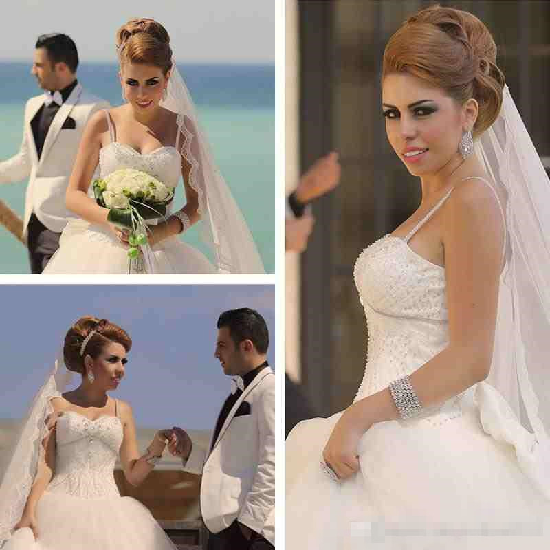 Gorgeous African Arabic Ball Gown Wedding Dress Sweetheart Spaghetti Straps Crystals Beading Top Corset Back Lace Applique Bridal Gown Bow, Black
Gorgeous African Arabic Ball Gown Wedding Dress Sweetheart Spaghetti Straps Crystals Beading Top Corset Back Lace Applique Bridal Gown Bow, Black
