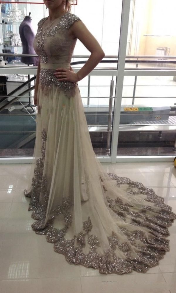 2015 New Best Selling Sexy Long Arabic Evening Dresses Cap Sleeve High Neck Beaded A Line Tulle Celebrity Prom Gowns, Green
2015 New Best Selling Sexy Long Arabic Evening Dresses Cap Sleeve High Neck Beaded A Line Tulle Celebrity Prom Gowns, Green