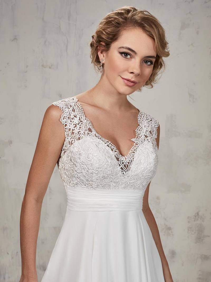 A-line wedding gown features lace top, chiffon skirt, V-neck, pleated empire waist line Bridal Gowns wedding dress