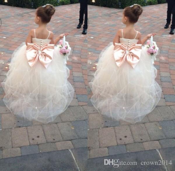 2022 Pageant Dresses For Girls With Bow Spaghetti Straps Flower Girl Dresses White Ivory Champagne Kids Ball Gowns Wedding Sash Beading Belt