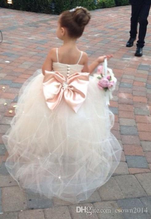 2022 Pageant Dresses For Girls With Bow Spaghetti Straps Flower Girl Dresses White Ivory Champagne Kids Ball Gowns Wedding Sash Beading Belt