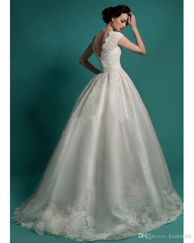 Sexy Mermaid Wedding Dresses Detachable Train Deep V Neck Cap Sleeves Vintage Arabic Lace Applique Cap Sleeve Overskirt Bridal Gowns