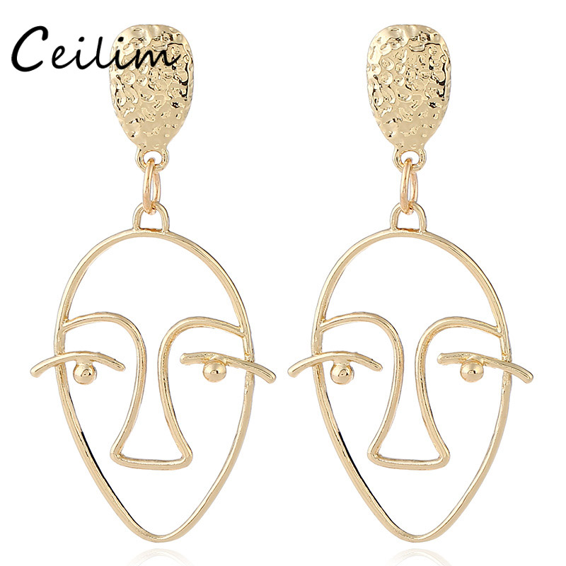 Exaggerated Gold-Plated Hollow Earrings: Retro Chic for European Women