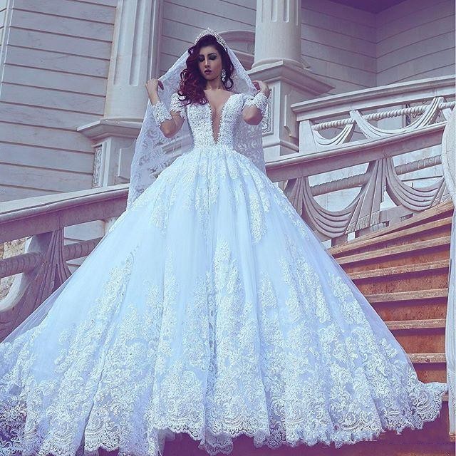 2017 New Arabia Ball Gown Wedding Dresses Deep V Neck Long Sleeves Illusion Lace Appliques Beaded Plus Size Court Train Formal Bridal Gowns, White
2017 New Arabia Ball Gown Wedding Dresses Deep V Neck Long Sleeves Illusion Lace Appliques Beaded Plus Size Court Train Formal Bridal Gowns, White