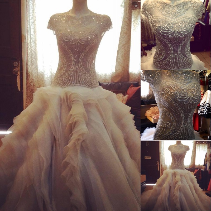 Luxury Wedding Dresses A Line Jewel Capped Short Sleeves Pearls Beading Crystal Bodice Covered Buttons Tiered Chapel Train Bridal Gowns, Ivory
Luxury Wedding Dresses A Line Jewel Capped Short Sleeves Pearls Beading Crystal Bodice Covered Buttons Tiered Chapel Train Bridal Gowns, Ivory