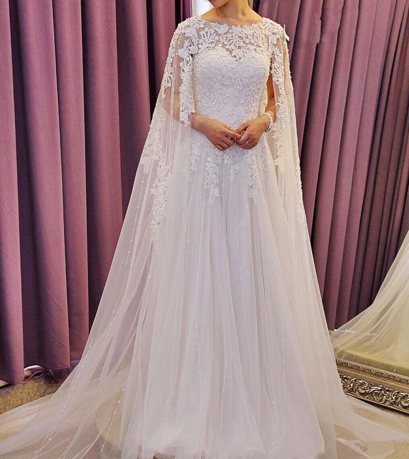 Saudi Arabia Muslim Dubai Wedding Dresses with Cloak Wrap Lace Bridal Gowns robe de mariage Applique Sequins Beading Wedding Gowns, Ivory
Saudi Arabia Muslim Dubai Wedding Dresses with Cloak Wrap Lace Bridal Gowns robe de mariage Applique Sequins Beading Wedding Gowns, Ivory