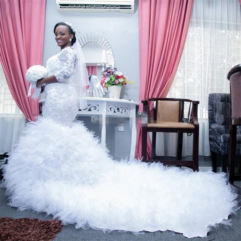 African Mermaid Wedding Dresses New Off Shoulder Long Sleeves Lace Appliques Beaded Plus Size Chapel Train Tulle Ruffles Bridal Gowns
