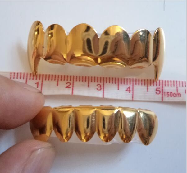 Wholesale-REAL GOLD REAL SHINY!! IMI SILVER PLATED HIPHOP TUSH TEETH VAMPIRE GRILLZ TOP AND BOTTOM GRILL SET
Wholesale-REAL GOLD REAL SHINY!! IMI SILVER PLATED HIPHOP TUSH TEETH VAMPIRE GRILLZ TOP AND BOTTOM GRILL SET