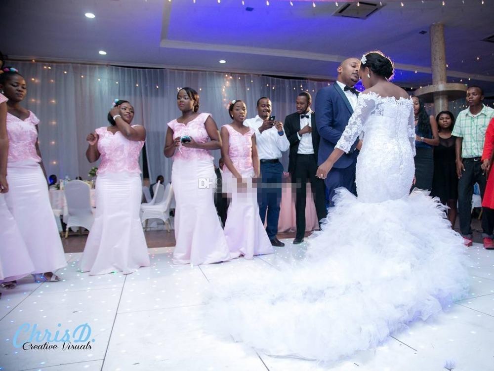 African Mermaid Wedding Dresses New Off Shoulder Long Sleeves Lace Appliques Beaded Plus Size Chapel Train Tulle Ruffles Bridal Gowns