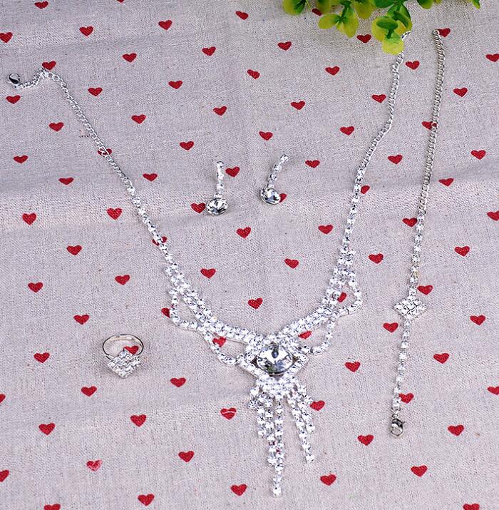 Four pcs jewelry set Crystal Wedding Crown Earrings Necklace Tiaras rings bracelet Accessories one set include four pcs HT123