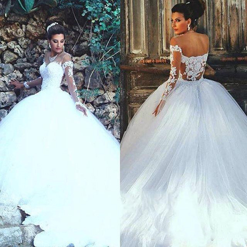 2018 Arabic Brand Wedding Dresses Illusion Long Sleeves Lace Appliques Tulle Plus Size Long Cathedral Train Formal Bridal Gowns, Champagne
2018 Arabic Brand Wedding Dresses Illusion Long Sleeves Lace Appliques Tulle Plus Size Long Cathedral Train Formal Bridal Gowns, Champagne