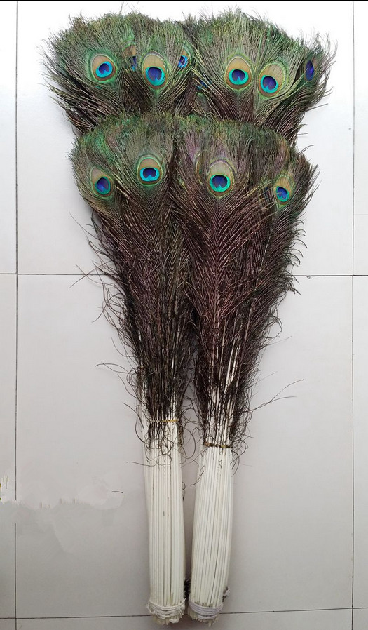 Whole 100pcslot 1044inch25110cm beautiful High quality natural peacock feathers eyes for DIY clothes decoration Wedding2929934