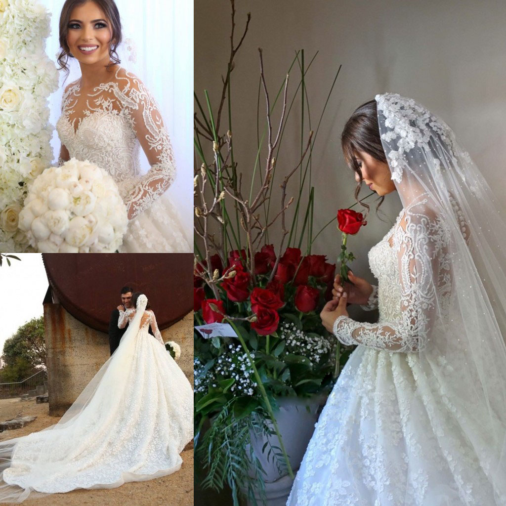 Full Lace Floral Appliques Wedding Dress Jewel Neck Long Sleeves Sheer Back Covered Button Wedding Gown Romantic Long Bridal Wedding Dresses