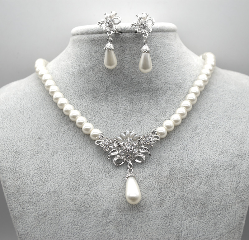Rhodium Silver Plated Cream Glass Pearl and Rhinestone Crystal Floral Bridal Necklace and Stud Earrings Jewelry Sets
Rhodium Silver Plated Cream Glass Pearl and Rhinestone Crystal Floral Bridal Necklace and Stud Earrings Jewelry Sets